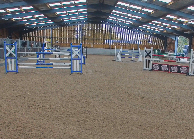 Close up on hurdles on equestrian arena